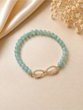 Aqua Beaded Infinity Bracelet with Gold Crystal Charm